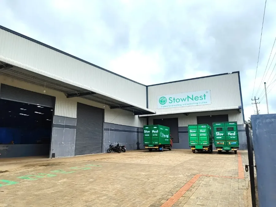 Real StowFlex branded delivery fleet and warehouse facility exterior